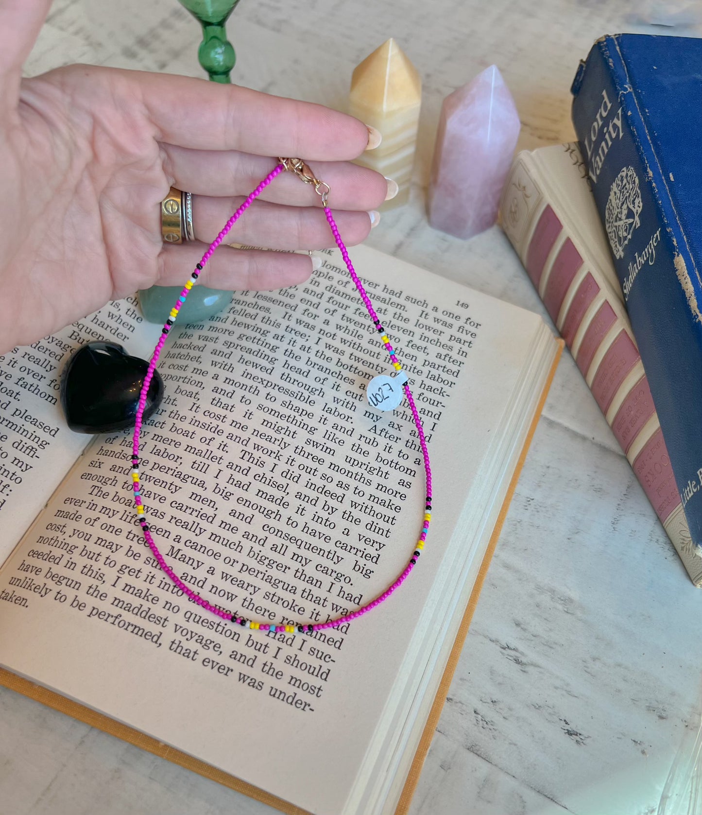 Colorful Beaded Necklace with Pink, Yellow, and Black Accents